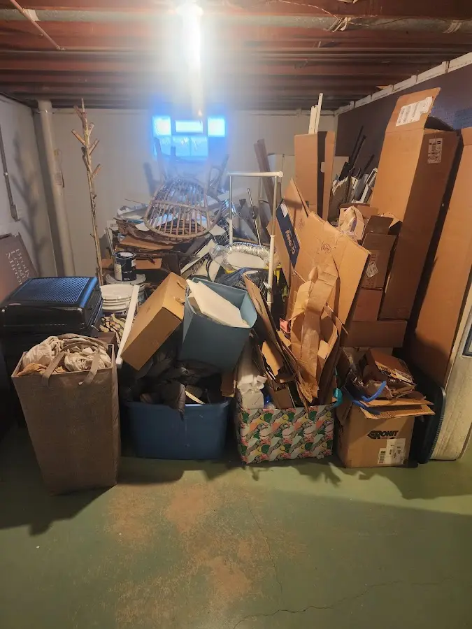 Roll-off dumpster container at job site for 15 Yard Dumpster Rental in Valley City